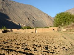 12 Tilled Fields And Mud And Rock Houses In Yilik Village On The Way To K2 China Trek.jpg
